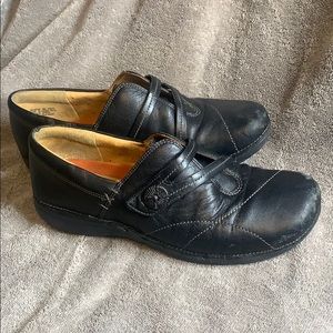 Clarks Unstructured black slip-on shoes, size 9